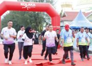 Bupati Yusran Pimpin Kontingen Konawe di Fun Run Harmoni Sultra 2025